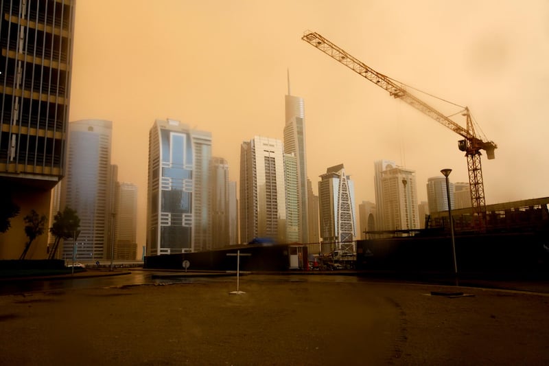 Dubai, April 7, 2013 - The sky took on an eerie orange cast during this morning's sandstorm over JLT in Dubai, April 7, 2013. (Photo by: Sarah Dea/The National)