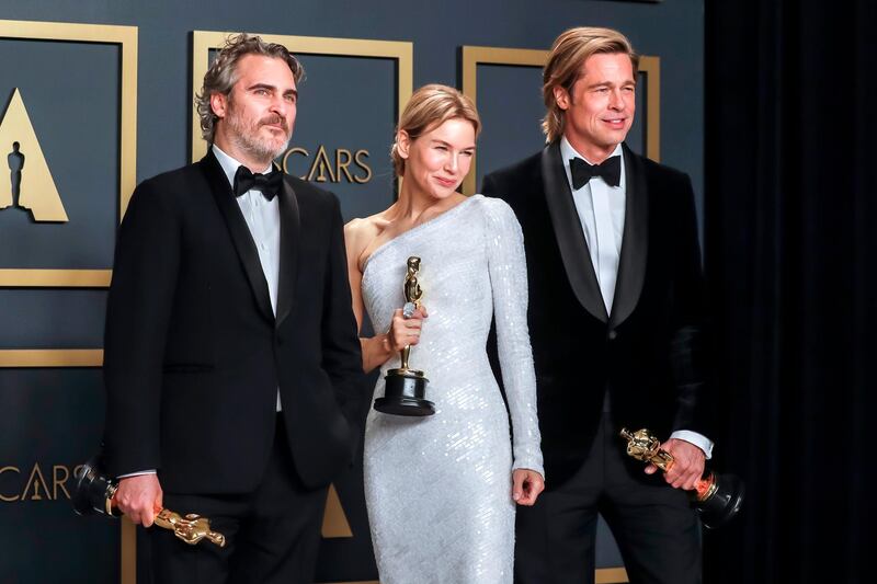 epa08208109 (L-R)Best Actor Joaquin Phoenix, Bests Actress, Renee Zellweger and Best Supporting Actor Brad Pitt pose in the press room with their awards during the 92nd annual Academy Awards ceremony at the Dolby Theatre in Hollywood, California, USA, 09 February 2020. The Oscars are presented for outstanding individual or collective efforts in filmmaking in 24 categories.  EPA-EFE/DAVID SWANSON