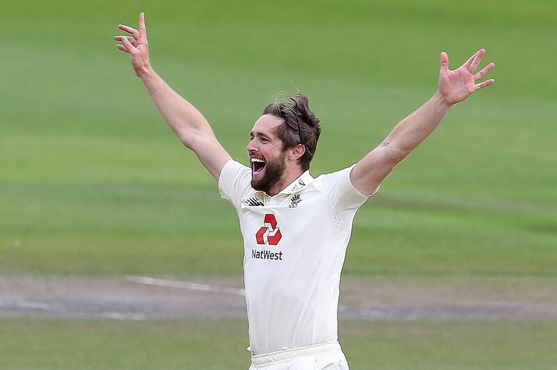 England's Chris Woakes celebrates taking the wicket of West Indies' Rahkeem Cornwall. AFP