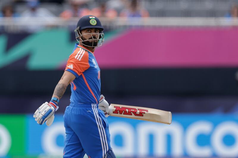 India's opening batsman Virat Kohli walks off after being dismissed for one run. AP