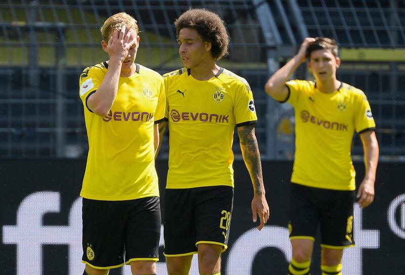 Dejected Borussia Dortmund players during their 4-0 home defeat to Hoffenheim. Reuters