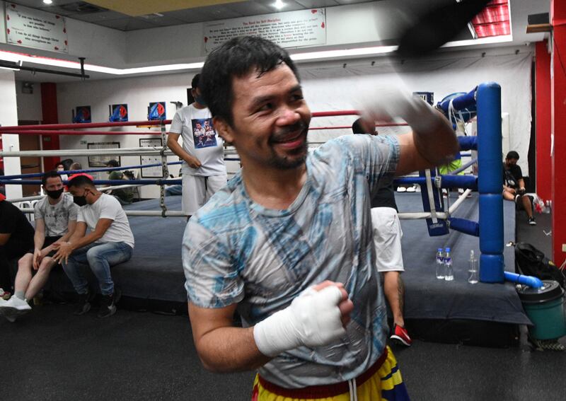 This photo taken on June 22, 2021 shows Philippine boxing legend and Senator Manny Pacquiao training at his gym in the city of General Santos in southern island of Mindanao for his upcoming bout against Errol Spence of the US.  - A two-year break from boxing has left Philippine legend Manny Pacquiao "hungry" to get back in the ring for what could be the last fight of his storied career -- and a warm-up for a presidential rumble.  (Photo by TED ALJIBE  /  AFP)  /  TO GO WITH STORY by Allison JACKSON