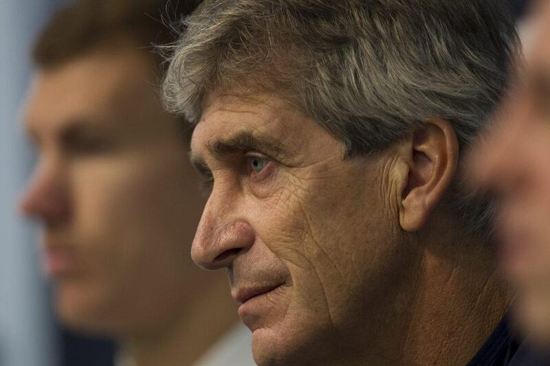 Manuel Pellegrini was manager of three Primera Liga clubs when coming up against Pep Guardiola, then in charge of Barcelona. Jon Super / AP Photo