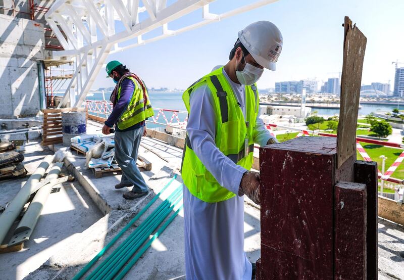 Abu Dhabi, United Arab Emirates, September 27, 2020.  Abu Dhabi City Municipality inspectors check safety standards of a construction site at the Al Raha Gardens, Abu Dhabi.
Victor Besa/The National
Section:  NA
Reporter:  Haneen Dajani