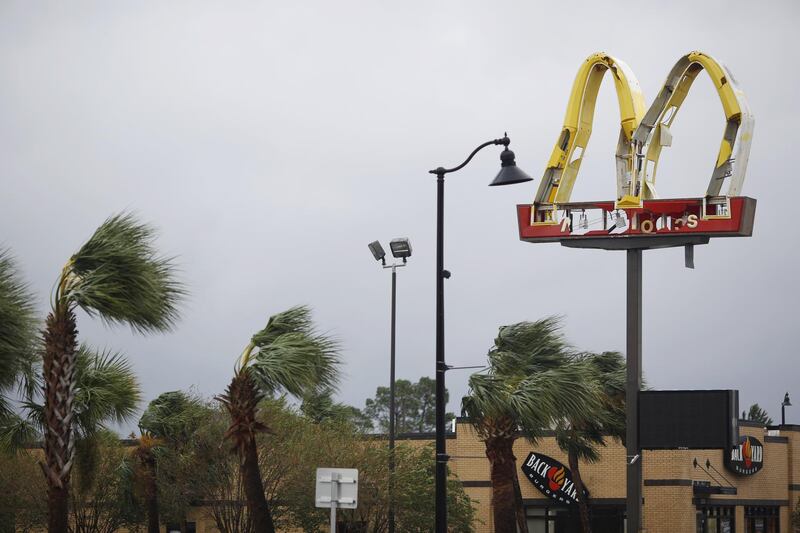 McDonald's signage stands damaged from Hurricane Michael in Panama City, Florida. Bloomberg