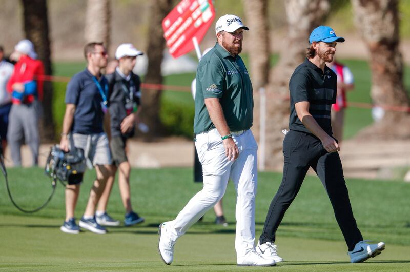 Abu Dhabi, United Arab Emirates, January 16, 2020.  2020 Abu Dhabi HSBC Championship.
  Shane Lowry and  Tommy Fleetwood on the 18th hole.
Victor Besa / The National
Section:  SP
Reporter:  Paul Radley and John McAuley