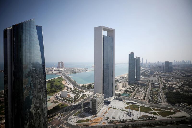 FILE PHOTO: A general view of ADNOC headquarters in Abu Dhabi, United Arab Emirates May 29, 2019. REUTERS/Christopher Pike/File Photo