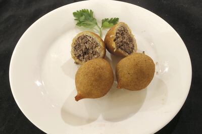 Fried kibbeh is displayed at the Durra market in Al-Madina Al-Munawara street in Amman, Jordan. (Salah Malkawi for The National)