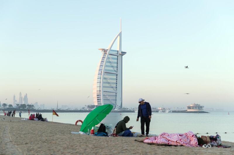 DUBAI, UNITED ARAB EMIRATES - Jan 1, 2018. 

Street cleanup at Downtown Dubai.

(Photo by Reem Mohammed/The National)

Reporter: Nawal Al Rawahi

Section: NA