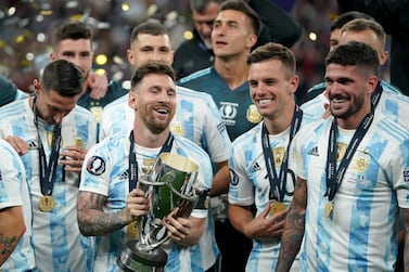 Argentinas Lionel Messi celebrates with the Finalissima 2022 trophy after the Finalissima 2022 match at Wembley Stadium, London. Picture date: Wednesday June 1, 2022.