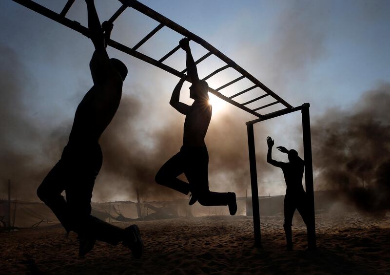 Palestinian cadets demonstrate their skills at a police college run by the Hamas-led interior ministry in Khan Younis in the southern Gaza Strip. Reuters