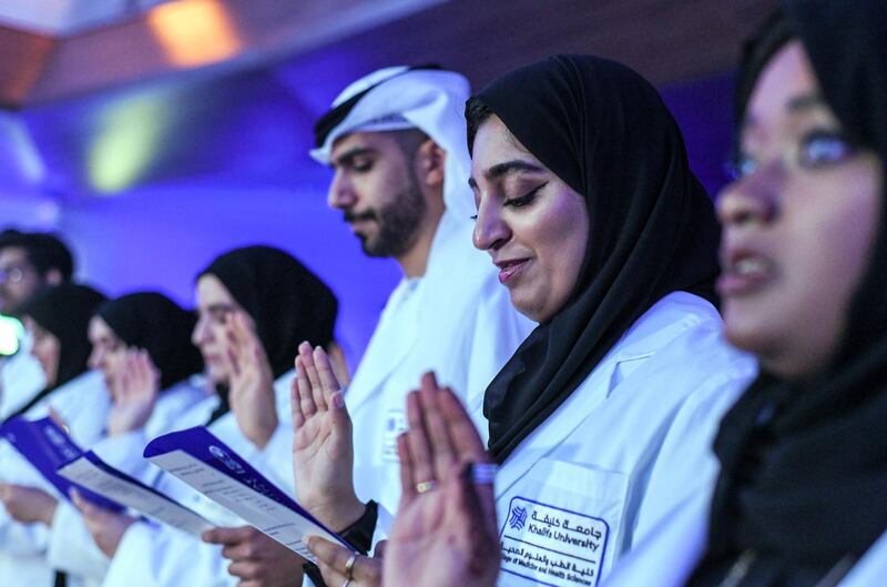 Abu Dhabi, United Arab Emirates - Graduating students during the oath taking of the ÔWhite CoatÕ ceremony in the College of Medicine and Health Sciences, at Khalifa University Campus in Abu Dhabi. Khushnum Bhandari for The National