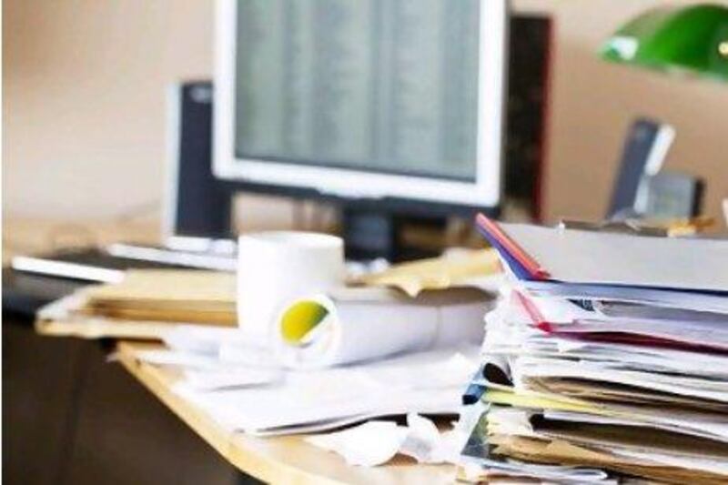 Experts say an untidy desk may suggest that a worker is busy, but the reality is somewhat different: it may mean a person is disorganised. istockphoto.com