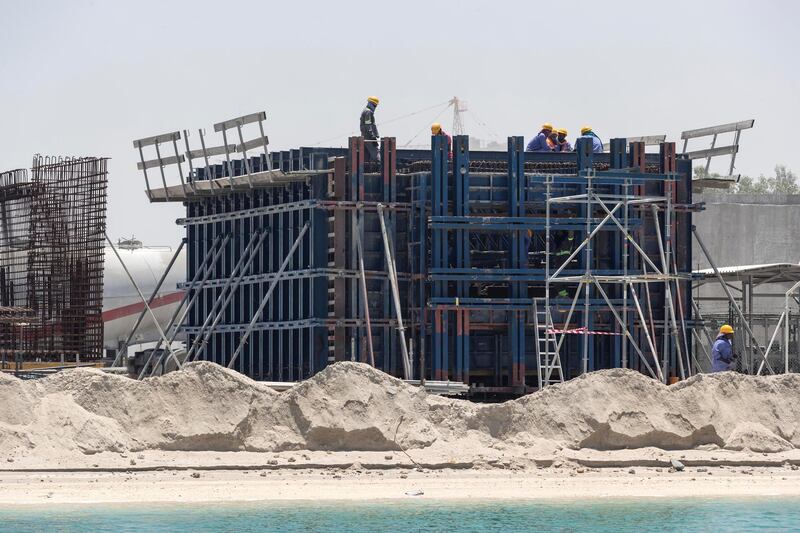 DUBAI, UNITED ARAB EMIRATES. 18 MAY 2020. The Heart of Europe project located on the World Islands of the coast of Dubai is progressing amidst the Covid-19 pandemic and is planning to sell units in the coming months to be delivered in October 2020. Construction and fit out on the Seahorse floaring villas.(Photo: Antonie Robertson/The National) Journalist: Patrick Ryan. Section: National.