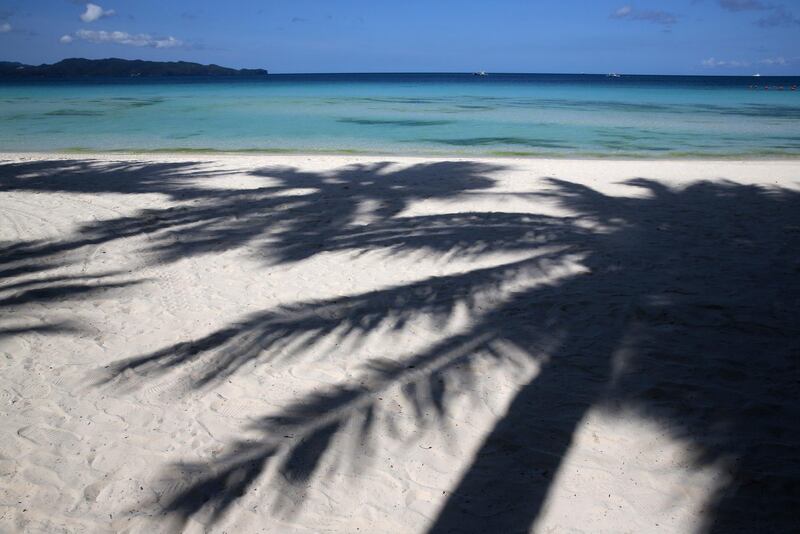 An empty beachfront lies at the no swim zone as the government implements the temporary closure of the country's most famous beach resort island of Boracay. Aaron Favila / AP Photo