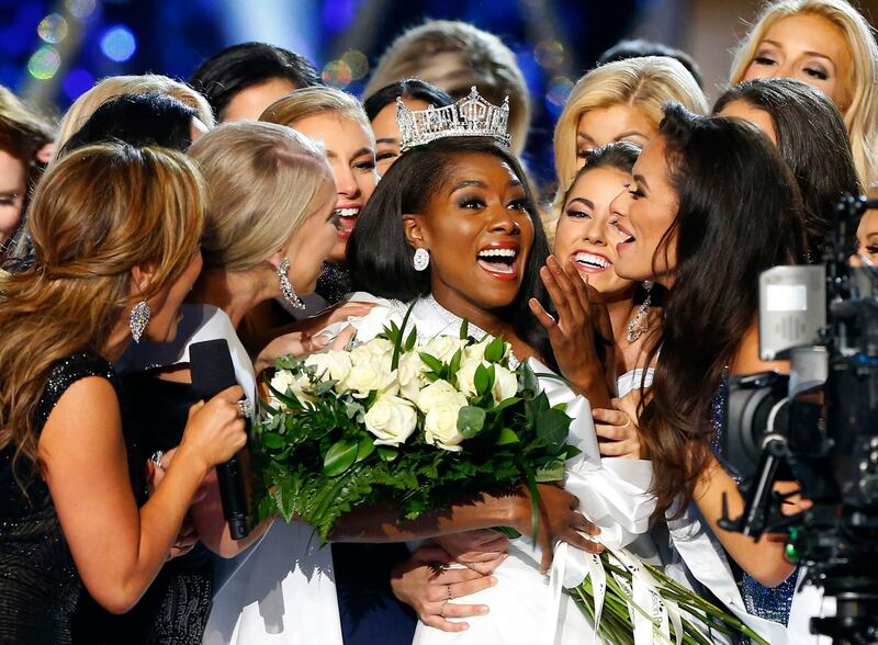 Miss New York Nia Franklin, center, reacts after being named Miss America 2019, Sunday, Sept. 9, 2018, in Atlantic City, N.J. (AP Photo/Noah K. Murray)