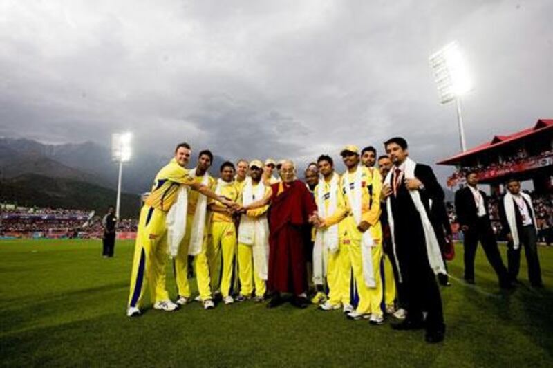 The Dalai Lama spent an hour as guest of honour at an Indian Premier League cricket match.