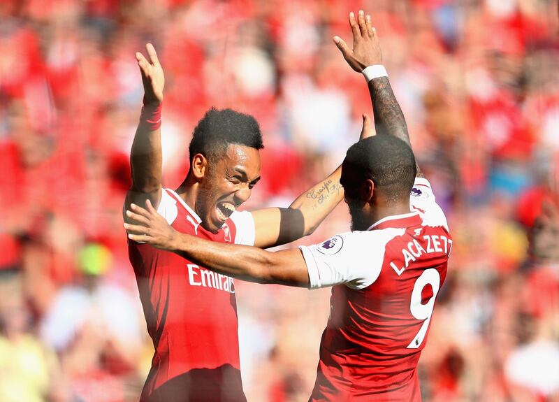 Pierre-Emerick Aubameyang of Arsenal celebrates after scoring his sides first goal. Clive Mason / Getty Images