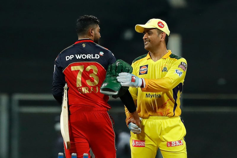 Chennai Super Kingsand Royal Challengers Bangalore players doing handshakes with each others  during match 19 of the Vivo Indian Premier League 2021 between the Chennai Super Kings and the Royal Challengers Bangalore held at the Wankhede Stadium Mumbai on the 25th April 2021.

Photo by Saikat Das / Sportzpics for IPL