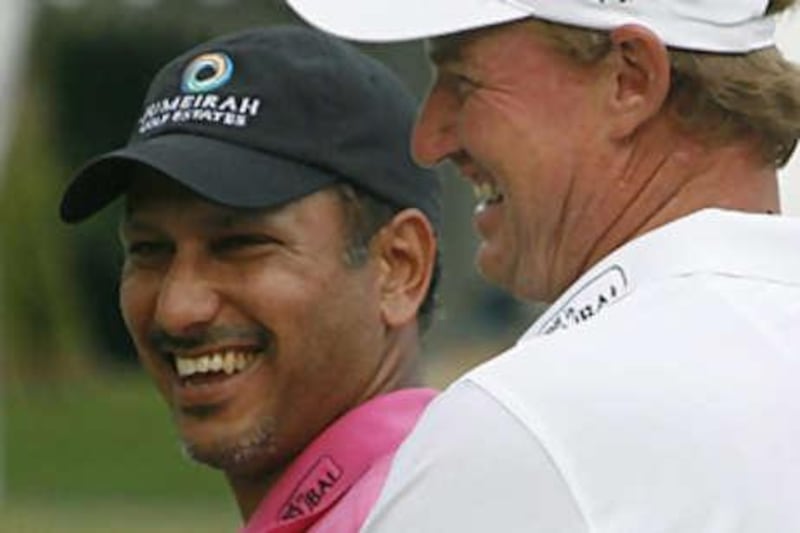 Jeev Milkha Singh of India, left, beat the best including Ernie Els to lift the Singapore Open title.