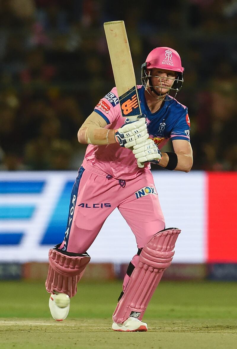 Rajasthan Royals' Steve Smith looks on after playing a shot during the 2019 Indian Premier League (IPL) Twenty20 cricket match between Rajasthan Royals and Kings XI Punjab at the Sawai Mansingh stadium in Jaipur on March 25, 2019. (Photo by Money SHARMA / AFP) / IMAGE RESTRICTED TO EDITORIAL USE - STRICTLY NO COMMERCIAL USE