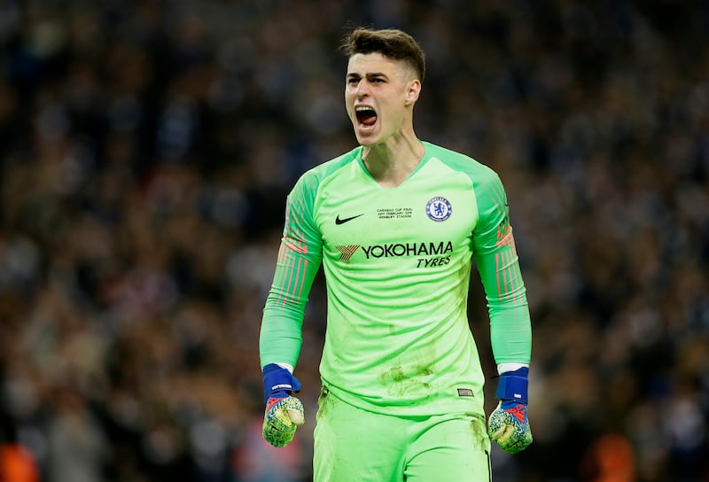 Chelsea goalkeeper Kepa Arrizabalaga reacts after stops a shot from Manchester City's Leroy Sane during a penalty shootout at the end of the English League Cup final soccer match between Chelsea and Manchester City at Wembley stadium in London, England, Sunday, Feb. 24, 2019. (AP Photo/Tim Ireland)