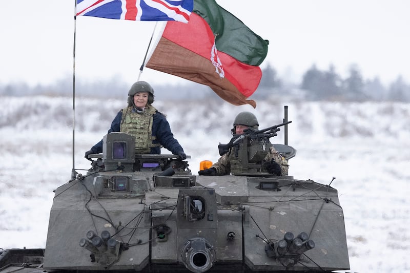 Liz Truss posed on board a tank during a visit to Estonia last year. Photo: 10 Downing Street