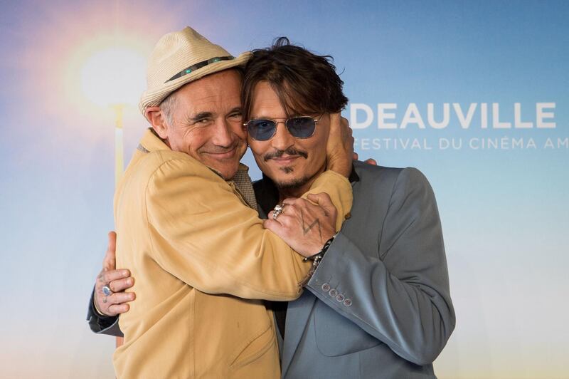 Mark Rylance and Johnny Depp pose during a photocall for 'Waiting for the Barbarians' during the 45th Deauville American Film Festival on September 8, 2019. AFP