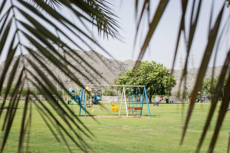 Following a major upgrade, the 39,000-square-metre park has a new lush, green landscape, playground equipment and other facilities. Reem Mohammed / The National