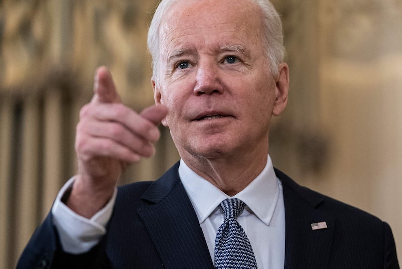 President Joe Biden answers a question from a reporter at the White House on December 3, 2021. AFP