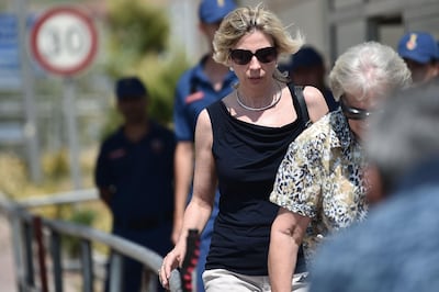 Norine Brunson (L), wife of US pastor Andrew Brunson who is detained in Turkey for over a year on terror charges, leaves after the trial of her husband, in Aliaga, north of Izmir, on July 18, 2018. 
 Andrew Brunson, head of a small Protestant church in the western city of Izmir, has been in detention since October 2016. Turkish prosecutors accuse Brunson of links to a group led by US-based Muslim preacher Fethullah Gulen -- who Ankara says was behind a failed 2016 coup -- and the Kurdistan Workers' Party (PKK).  / AFP / OZAN KOSE
