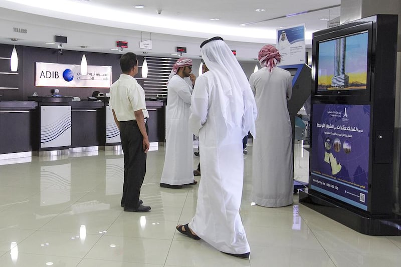 Abu Dhabi Islamic Bank will possibly be lending slightly less to SMEs in 2015, a bank official said. Mona Al Marzooqi / The National