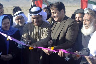 Juma Al Kaabi, centre left, was the UAE's ambassador to Afghanistan. He died from his injuries a month after the bombing in January 2017. Kandahar Gov Office / EPA