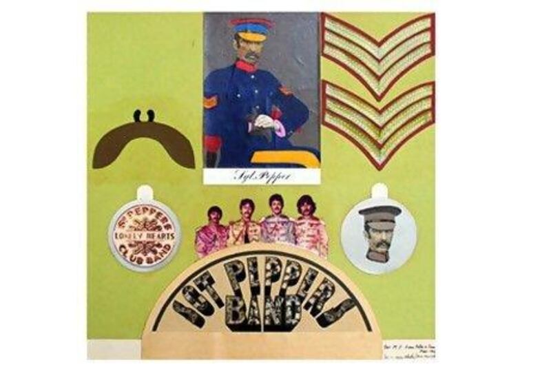 Peter Blake with the album art - insert on the left, cover on the right - for Sgt. Pepper's Lonely Hearts Club Band. PA Archive / Press Association Images