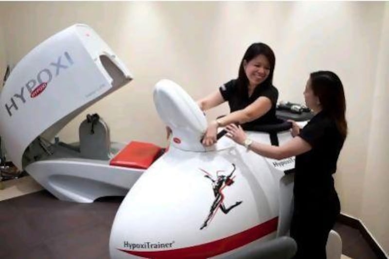 Using the Hypoxi machine is a little like cycling in a life-support pod from a science fiction film, says Hugo Berger. Silvia Razgova / The National