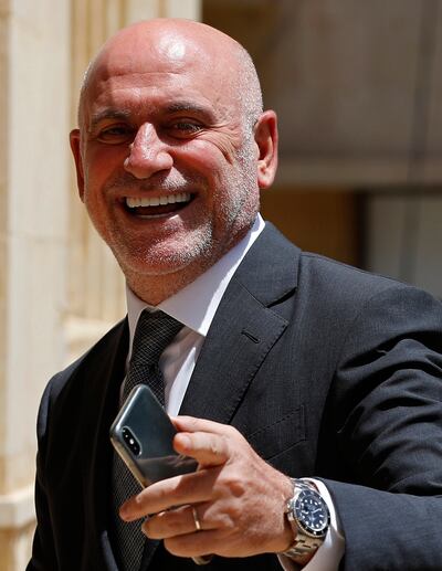 Then public works and transportation minister Youssef Fenianos enters Parliament in Beirut, Lebanon, in 2018. AP