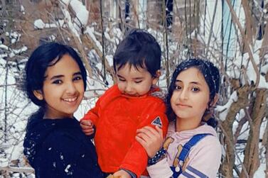 Three of the Al Hussein's four children play in the snow in Edinburgh, their home of the last two years, thanks to the VPRS. Courtesy Al Hussein family.     