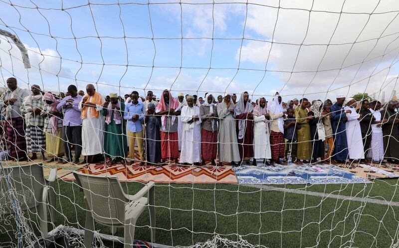 Muslims attend the morning prayers of Eid Al Fitr, marking the end of the holy month of Ramadan, in Mogadishu, Somalia. Reuters