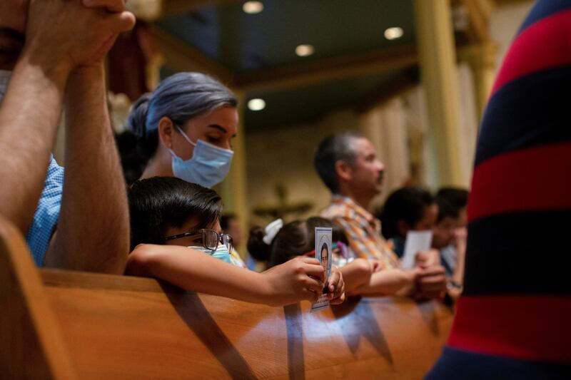 People gather for a special Mass for the migrants in San Antonio. Reuters