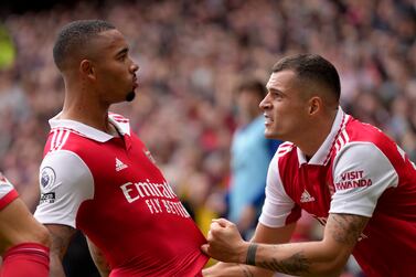 Arsenal's Gabriel Jesus, left, celebrates with Arsenal's Granit Xhaka after scoring his side's second goal during the English Premier League soccer match between Arsenal and Tottenham Hotspur, at Emirates Stadium, in London, England, Saturday, Oct.  1, 2022.  (AP Photo / Kirsty Wigglesworth)