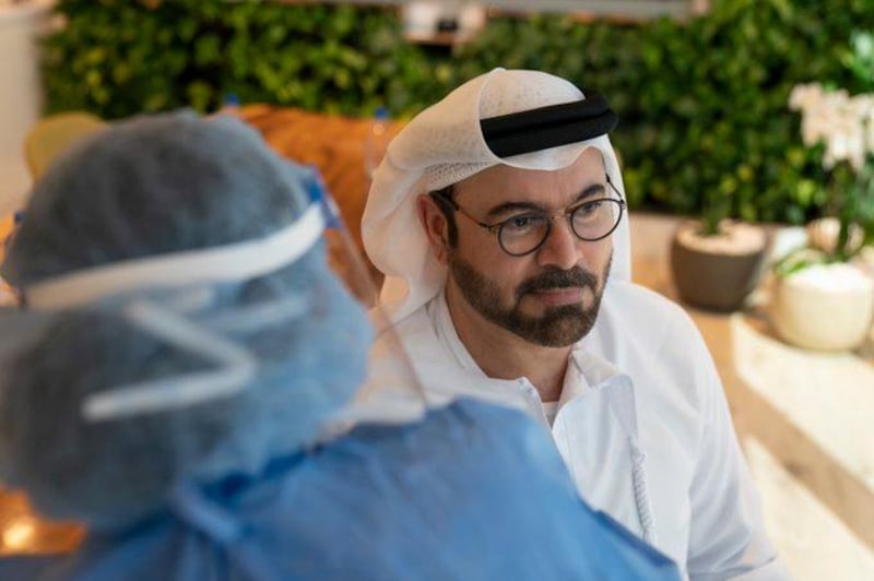 Mohammad Al Gergawi, Minister of Cabinet Affairs, receives the Covid-19 Sinopharm vaccine on Saturday, October 31.  Courtesy: UAE Government Twitter