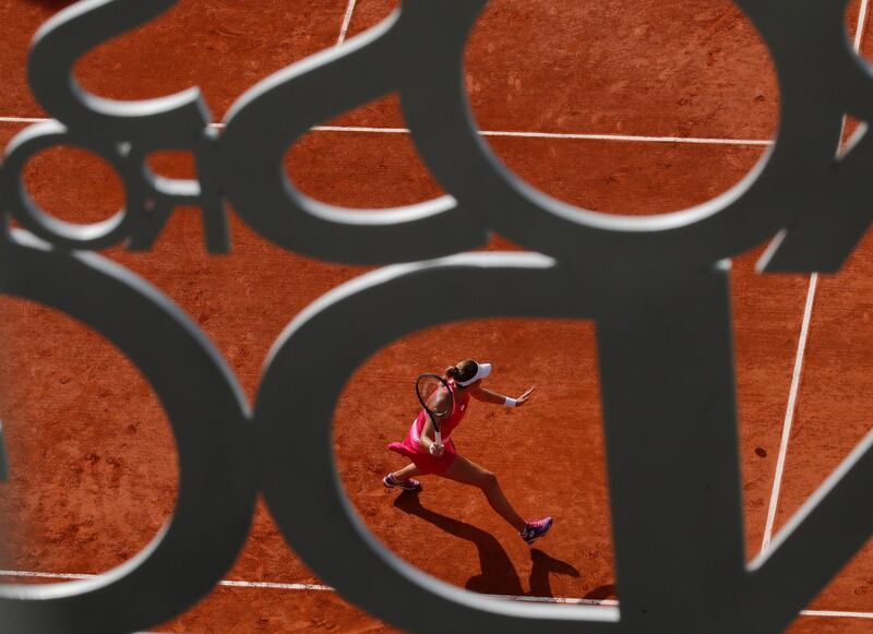 Russia's Alina Charaeva plays a shot in her third round junior girls match again Italy's Matilde Paoletti of the French Open tennis tournament at the Roland Garros stadium in Paris, France. AP Photo