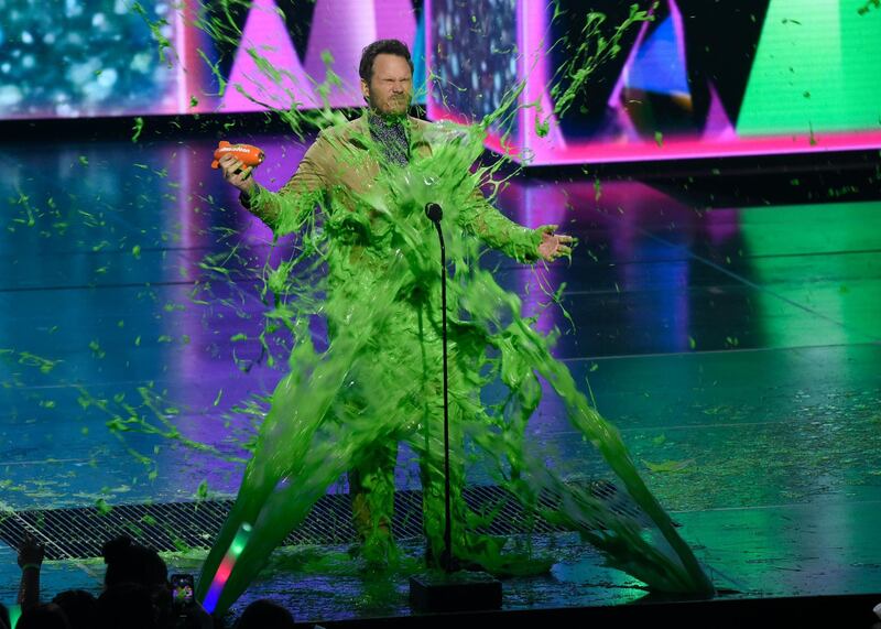 Chris Pratt gets slimed as he accepts the award for "favourite butt-kicker" for 'Jurassic World: Fallen Kingdom'. AP