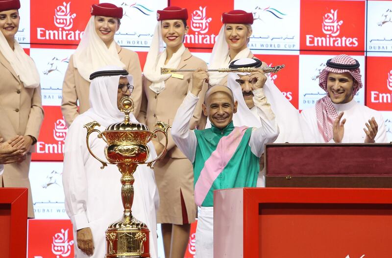 
DUBAI , UNITED ARAB EMIRATES – March 25 , 2017 :  Arrogate  ( USA ) number  ( 9 ) ridden by  Mike Smith won the 9th horse race Dubai World Cup 2000m ( dirt ) at the Meydan Racecourse in Dubai. Sheikh Hamdan Bin Rashid Al Maktoum , Deputy ruler of Dubai is also seen in the photo on left. ( Pawan Singh / The National ) For News. Story by Amith Passela. ID No - 76600
 *** Local Caption ***  PS2503- DWC59.jpg