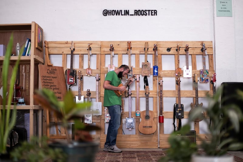 DUBAI, UNITED ARAB EMIRATES - May 30 2019.

Howlin' Rooster workshop specializes in building and customizing various stringed instruments. It is currently located in KAVE, The Story of Things, an upcycling cafe concept in Al Serkal avenue.

The space offers different workshops that take place weekly, including guitar making, embroidery lessons, meditation sessions, bottle cutting workshops and chaircycling rides.

(Photo by Reem Mohammed/The National)

Reporter: 
Section: WK