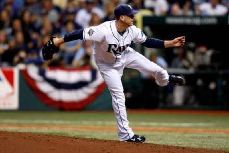 Scott Kazmir of the Tampa Bay Rays reacts after striking out Jimmy Rollins of the Philadelphia Phillies to end the fourth inning of game one of the Major League Baseball (MLB) World Series at Tropicana Field in St. Petersburg, Florida, U.S., on Wednesday, Oct. 22, 2008. The Rays are seeking their first World Series title, while the Phillies are looking to win the championship for the first time since 1980. Photographer: Matt Stroshane/Bloomberg News *** Local Caption ***  471022.jpg