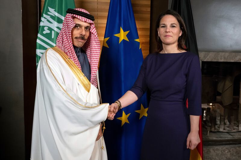 Saudi Arabia's Foreign Minister Prince Faisal bin Farhan Al Saud with German counterpart Annalena Baerbock at the Munich Security Conference in Germany. AP