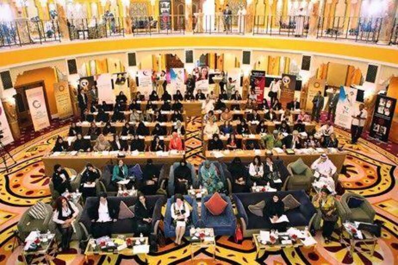 Entrepreneurs and officials attend the 14th Global Women Leaders Summit at the Burj Al Arab hotel in Dubai earlier this month. Amy Leang / The National