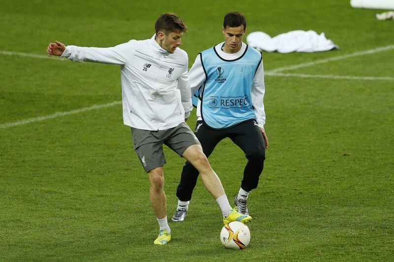 Liverpool’s Adam Lallana and Philippe Coutinho during training. Action Images via Reuters / Lee Smith