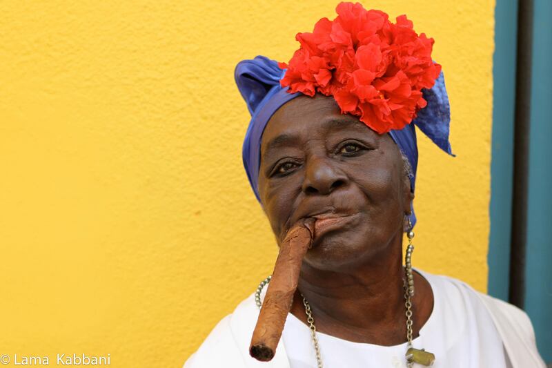 Havana City Cuba 2010 Cuban woman poses with their famous cigars